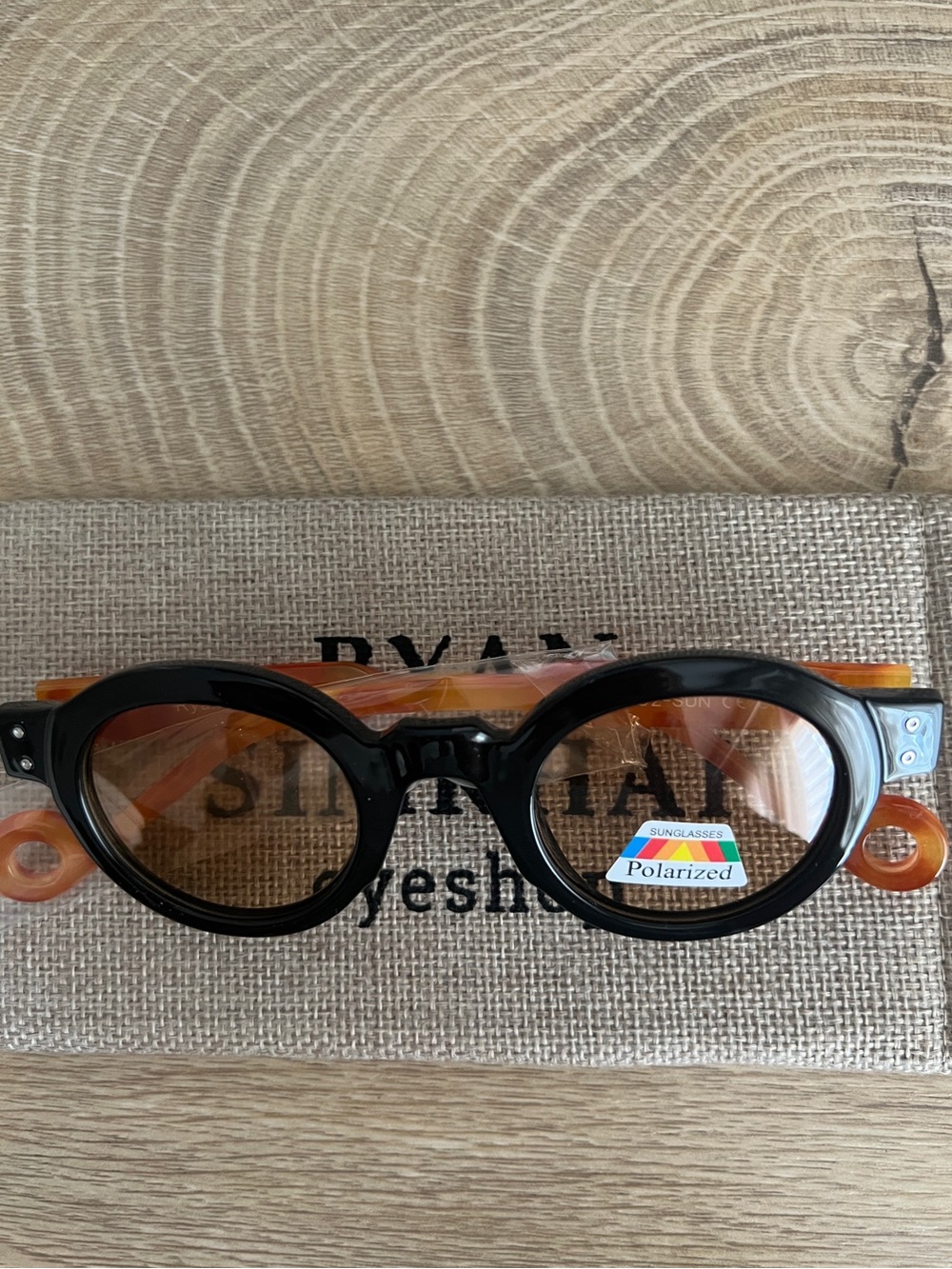 Polarized Black & Amber Oval Women's Sunglasses